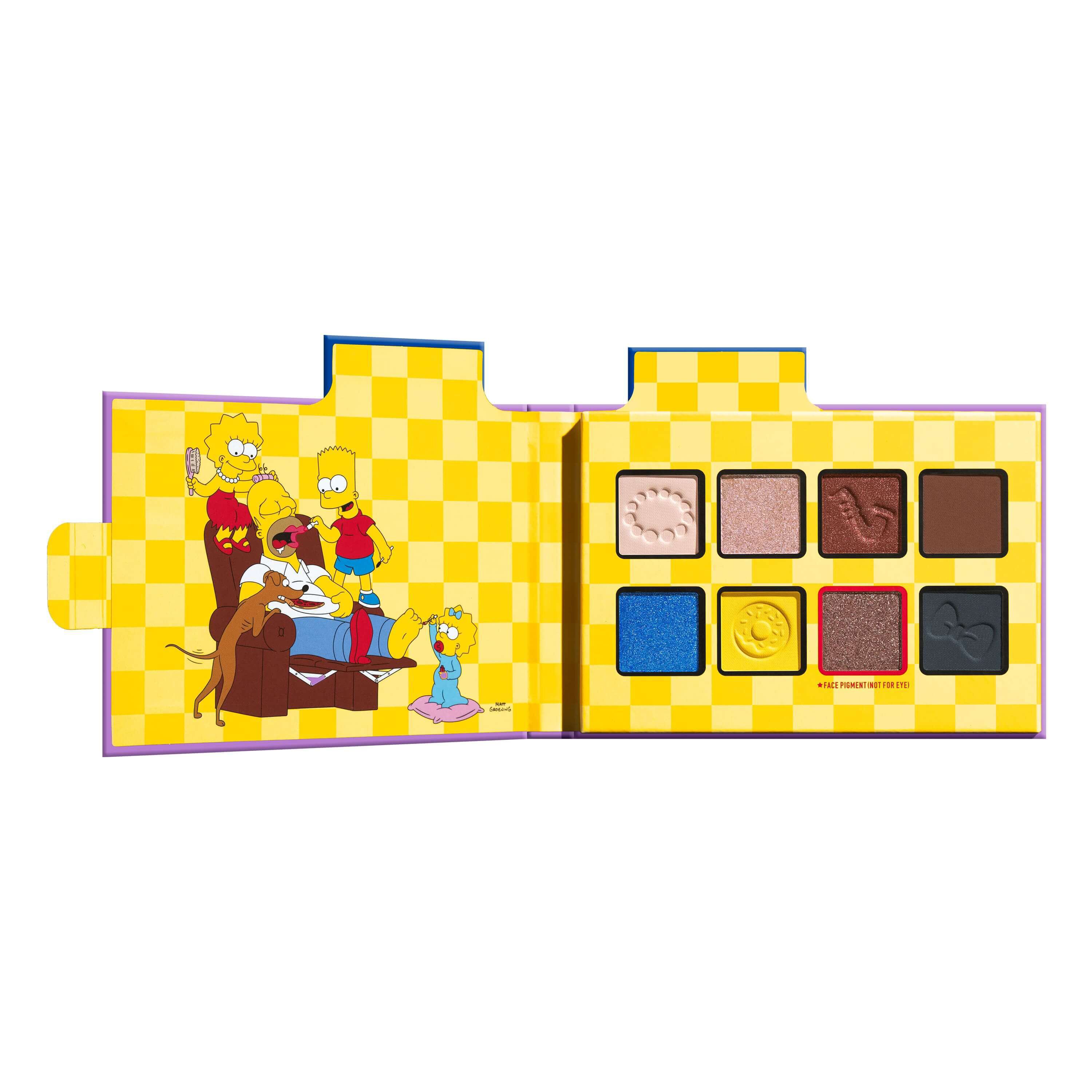 Palette di ombretti aperta NYX The Simpsons Family Color Palette che mostra le tonalita interne e l'illustrazione dei personaggi.