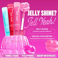 Bold pink NYX promotional image with jelly-themed graphics. Three tubes of Jelly gloss are displayed with a large pink jelly mold. Text reads: "No filler, just jelly! Jelly smooth lip smoothing shine. Jelly juicy full-bodied volume." Bottom row includes icons for vegan formulas, cruelty-free, and no makeup retouching.